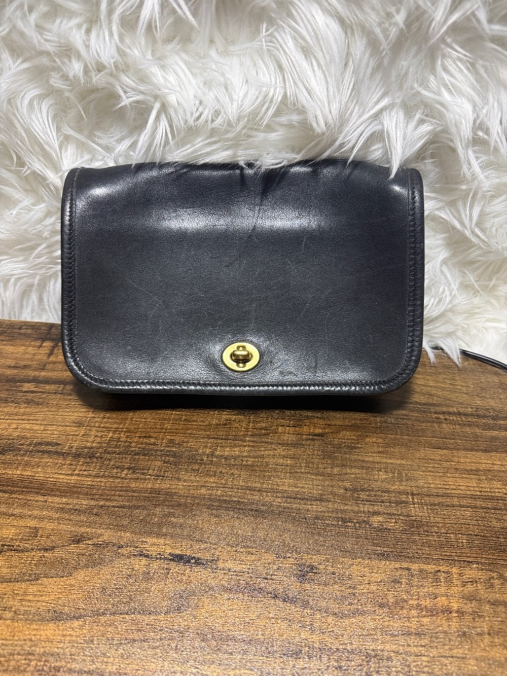 Classic Black Leather Crossbody Bag with Turn-Lock Closure